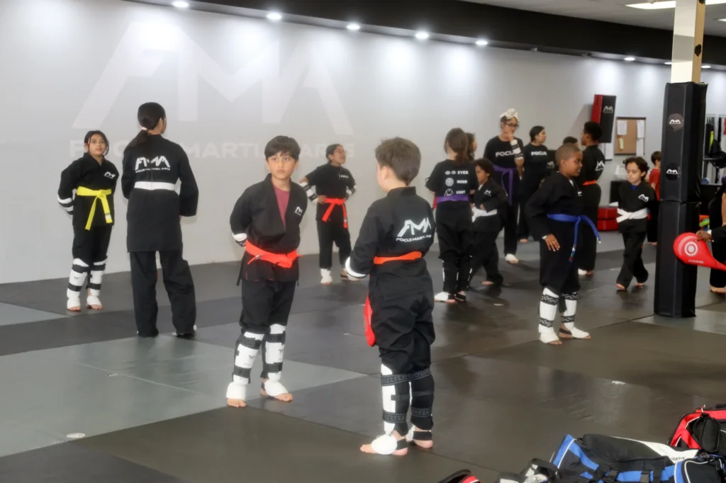Focus Martial Arts Kids martial arts students in protective sparring gear